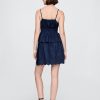 Fusta mini denim cu ochiuri