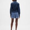 Fusta mini din denim plisat