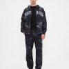 Gap × Joggeri largi cu craniu greoi, de la Disney Tim Burton, The Nightmare Before Christmas Gap × Joggeri largi cu craniu greoi, de la Disney Tim Burton, The Nightmare Before Christmas