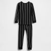 Gap × Set de pijamă din bumbac organic pentru bebeluși și copii mici, The Nightmare Before Christmas, de la Disney Tim Burton Gap × Set de pijamă din bumbac organic pentru bebeluși și copii mici, The Nightmare Before Christmas, de la Disney Tim Burton