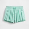Pantaloni scurți pentru alergare cu tivul fluture pentru copii