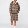 Pantaloni scurți relaxați din pânză în carouri Pantaloni scurți relaxați din pânză în carouri