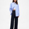 Pantaloni simpli cu picioare late Pantaloni simpli cu picioare late