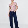 Top cu mâneci flutter din crepon Top cu mâneci flutter din crepon