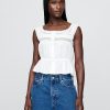 Top peplum cu dantelă