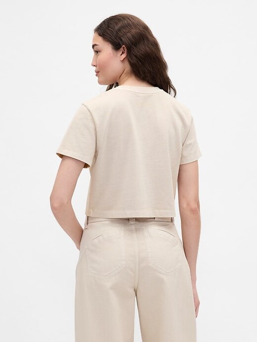 Tricou grafic Gap × BÉIS din bumbac organic VintageSoft Crop Tricou grafic Gap × BÉIS din bumbac organic VintageSoft Crop