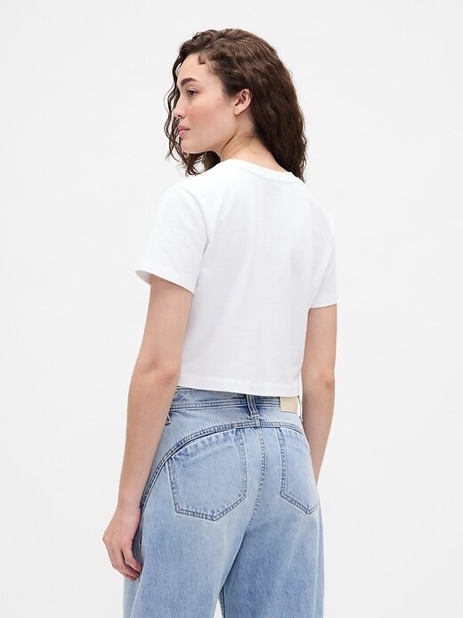 Tricou grafic Gap × BÉIS din bumbac organic VintageSoft Crop Tricou grafic Gap × BÉIS din bumbac organic VintageSoft Crop